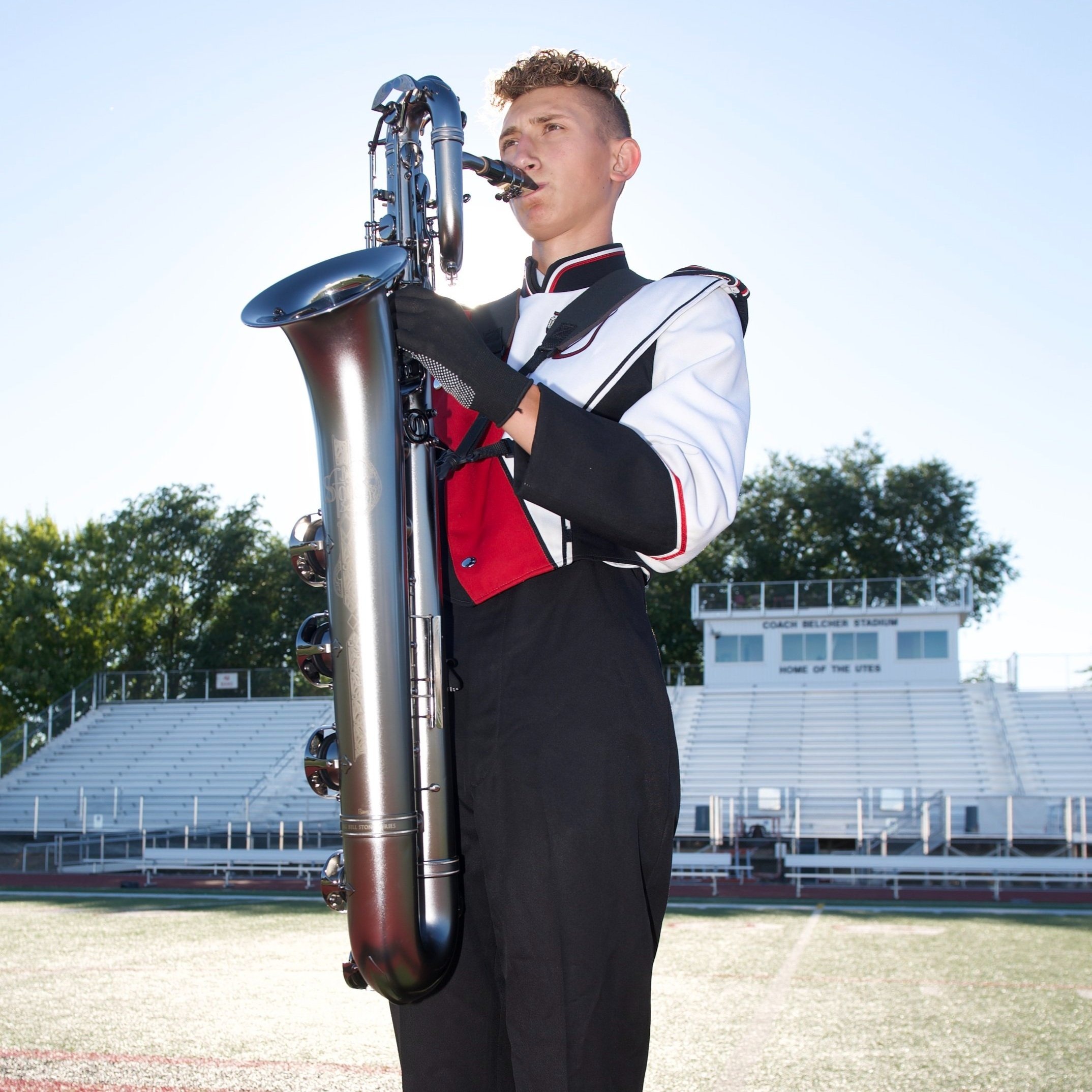 Portrait of a young graduate and musician, his future playing through the image.